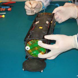 TuPOD project. Last phase of the TubeSats integration into the TuPOD satellite. Courtesy GAUSS